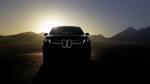 На тизерном изображении BMW iX3 2026 года запечатлена яркая передняя подсветка
